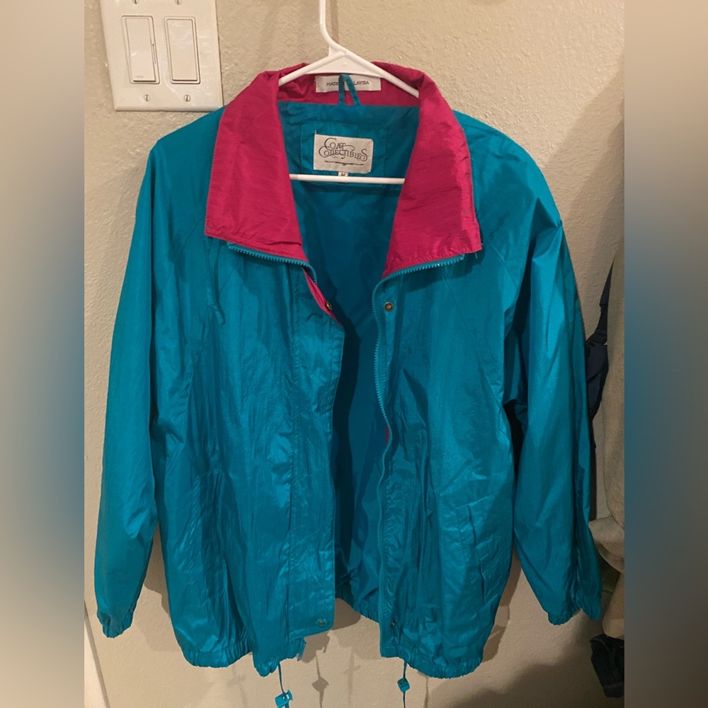 “Coat collectibles” teal blue and pink wind breaker 1990’s